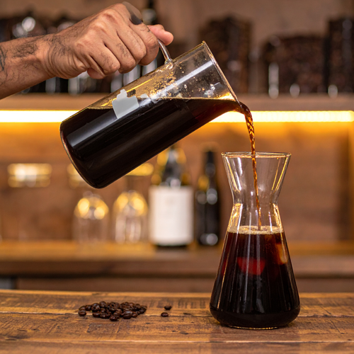 Barista Pouring Cold Brew Coffee Image