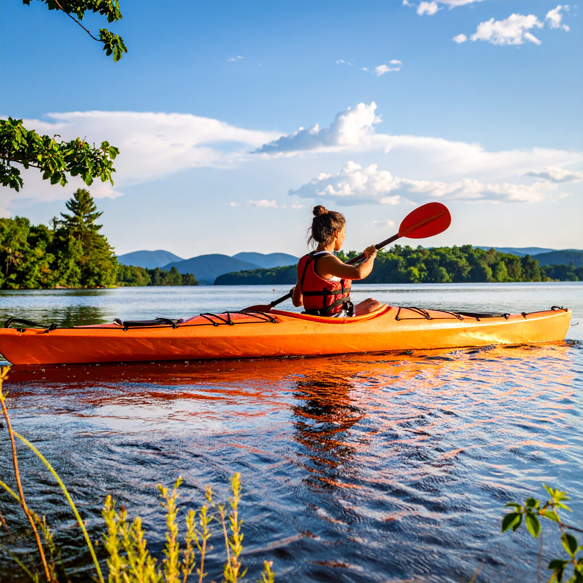 Kayaker on Brant Lake